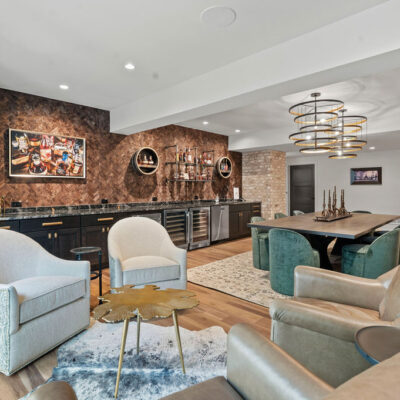 Bourbon Room With Seating Area Tasting Table and Bourbon Bar With Storage and Appliances