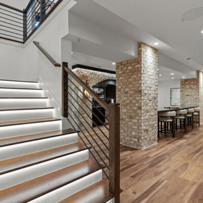 Stairs Integrated With Lighting Going To Lower Level Bourbon and Media Room