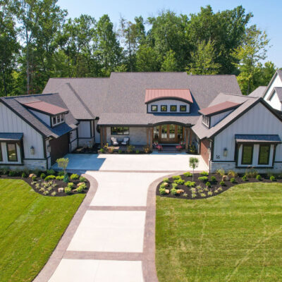 Carriage House Garages With Eyebrow Dormers With Small Windows