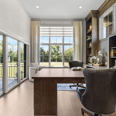 Home Office With Custom Built-Ins Shared Two Sided Desk