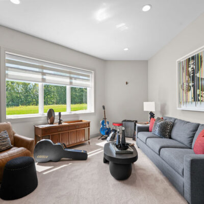 Lower Level Bedroom With Walk-In Closet Music Room Theme