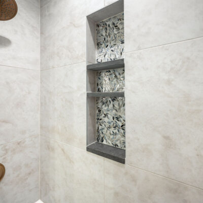 Lower level Full Bathroom With Accent Tile Shower Niche