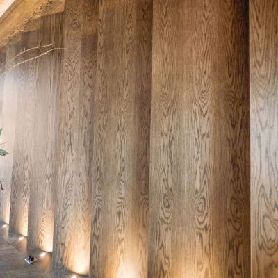 Sawtooth Stained Wood Wall in Acoustically Designed Piano Room