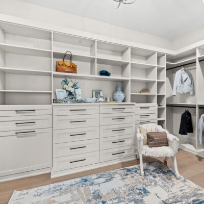 Primary Bedroom Walk-In Closet California Closet System