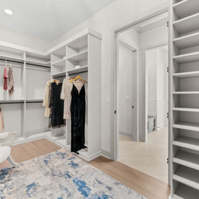 Primary Bedroom Walk-In Closet California Closet System